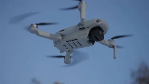 Mini drone is flying in the air Stock Footage 237186152