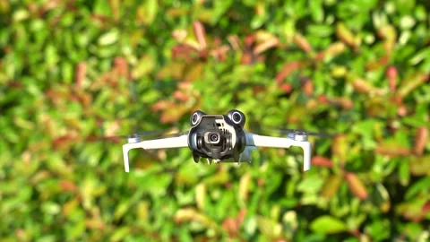 Mini  drone hovering Stock Footage 279591166