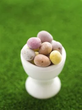 Mini eggs in egg cup Stock Photos