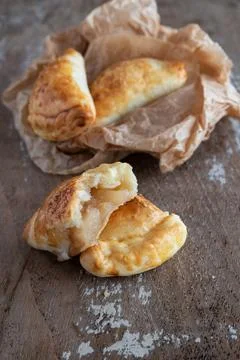 Mini empanadas stuffed with apple compote and cinnamon Stock Photos