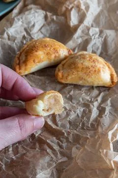 Mini empanadas stuffed with apple compote and cinnamon Stock Photos