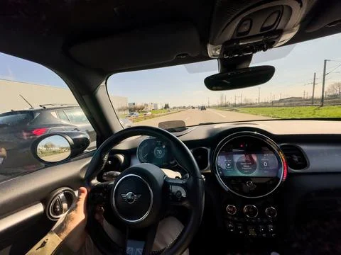 MINI EV interior on highway Stock Photos