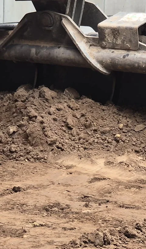 Mini Excavator Leveling Soil for Garden Landscaping Vertical Stock Footage 332932069
