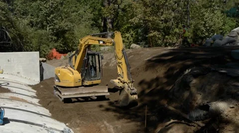 Mini Excavator moving dirt Stock Footage 8686393