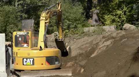 Mini Excavator moving dirt Stock Footage 8686431