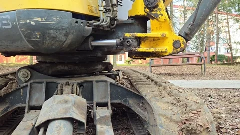 Mini excavator parked on a construction site, close-up. Stock-Footage 332189955