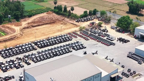 Mini excavators lined up at an equipment manufacturing yard Stock-Footage 340607713