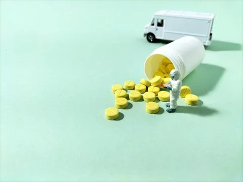 Mini figure checking medicines Stock Photos