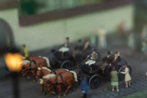 Mini figures of Horse-drawn cart, macro photography, selective focus. Stock Photos