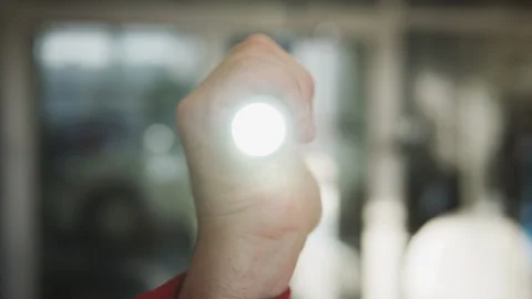 Mini Flashlight Close Up - light ray of battery torch Stock Footage 106257934