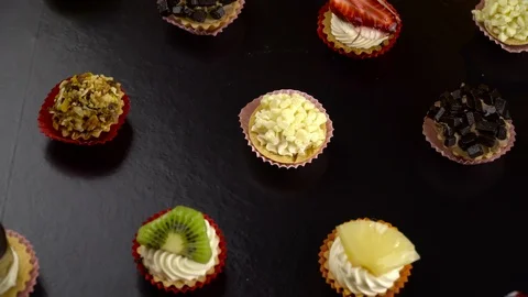 Mini Fruit Dessert Turning on Black Backround Видео 86613946