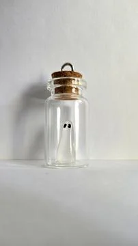 Mini Ghost in Glass Jar Stock Photos