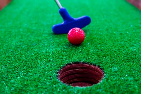 Mini-golf. Close-up of the hole into which the ball is rolled. Stock Photos