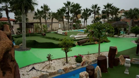 Mini Golf Course with Palm Trees in Mediterranean Resort in Spain Stock Footage 331620341