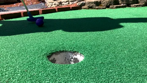 Mini golf misses put Stock Footage 205713833