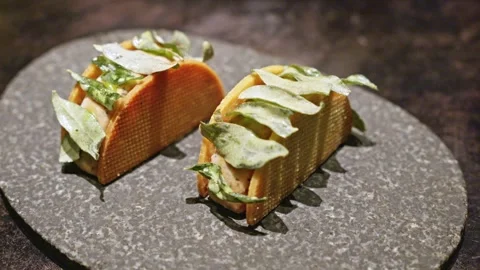 Mini Gourmet Tacos with Leaf Garnish Stock Footage 314347301