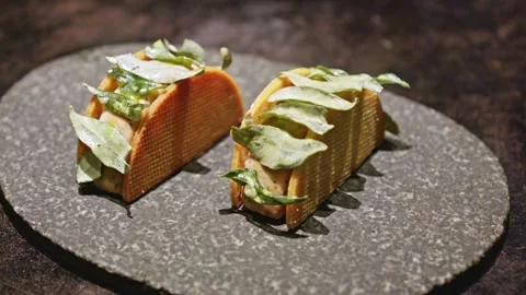 Mini Gourmet Tacos with Leaf Garnish Stock Footage 314347304