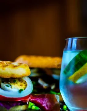 Mini grilled sandwich with various cold meats, cheese, mushrooms, tomato Stock Photos