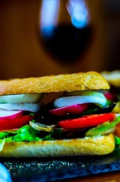 Mini grilled sandwich with various cold meats, cheese, mushrooms, tomato Stock Photos