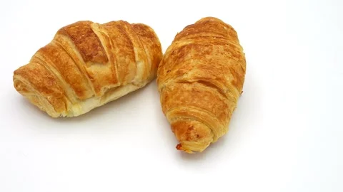 Mini Ham Cheese Croissants Rotating On White Background. Stockbeeldmateriaal 265529294