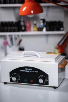 Mini high temperature sterilizer in manicure salon Stock Photos