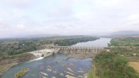 Mini Hydro Electric and Irrigation dam spillway on misty morning. Drone Aerial Stock-Footage 106650875