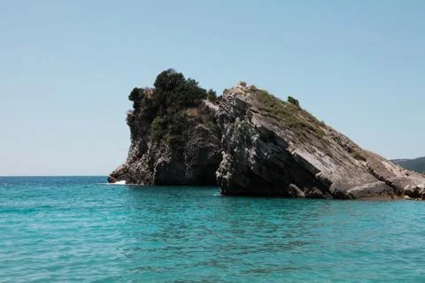 Mini island with rocks Stock Photos
