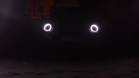 Mini John Cooper Works comes out of the dark Stock Footage 211085185