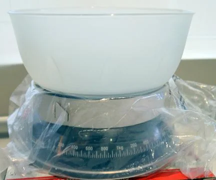 Mini kitchen weighing scale for precise measurement Stock Photos