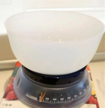 Mini kitchen weighing scale for precise measurement Stock Photos