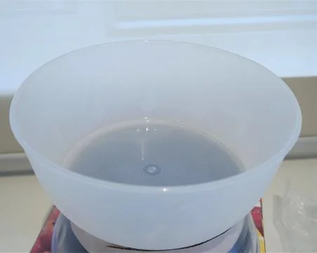 Mini kitchen weighing scale for precise measurement Stock Photos