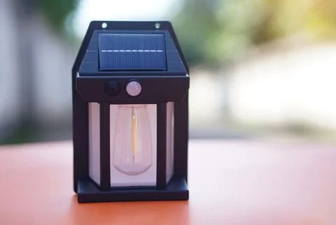 Mini lantern with solar panel. Concept, electrical equipment, generate electrici Stock Photos