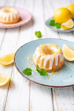 Mini lemon bundt cakes topped with lemon glaze Stock Photos