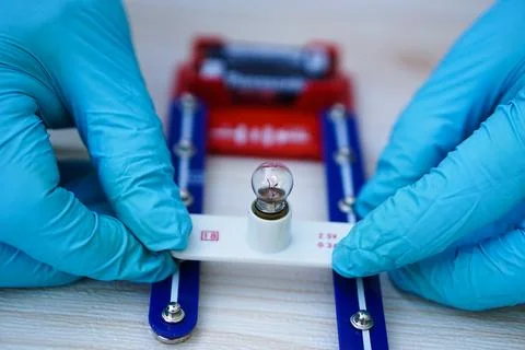 Mini light bulb kit to demonstrate science experiment about electricity circuit Stock Photos