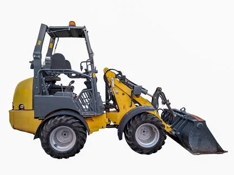 Mini loader machine isolated in a clear setting showcasing construction cap.. Stock Photos