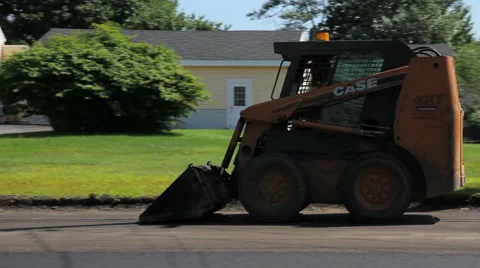 Mini loader working road construction Stock Footage 40715000