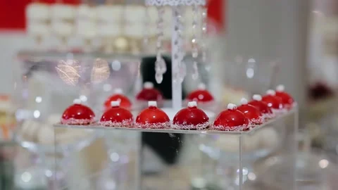 Mini marshmallows on top of cupcakes icings. Sweet holiday buffet on wedding. Stock Footage 132697437