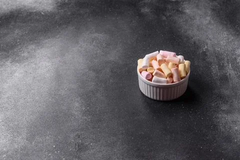 Mini marshmallows in white, pink, and pastel colors. Marshmallows as a food.. Stock Photos