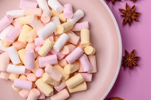 Mini marshmallows in white, pink, and pastel colors. Marshmallows as a food.. Stock Photos