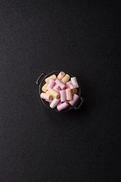 Mini marshmallows in white, pink, and pastel colors. Marshmallows as a food.. Stock Photos