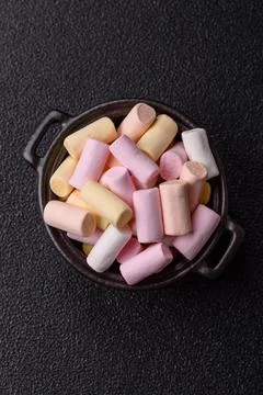 Mini marshmallows in white, pink, and pastel colors. Marshmallows as a food.. Stock Photos