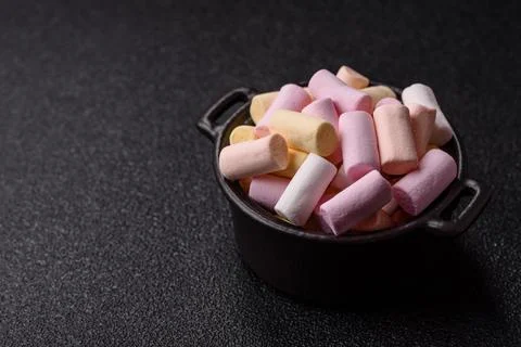 Mini marshmallows in white, pink, and pastel colors. Marshmallows as a food.. Stock Photos