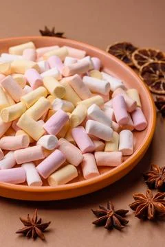 Mini marshmallows in white, pink, and pastel colors. Marshmallows as a food.. Stock Photos