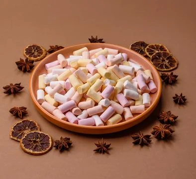 Mini marshmallows in white, pink, and pastel colors. Marshmallows as a food.. Stock Photos