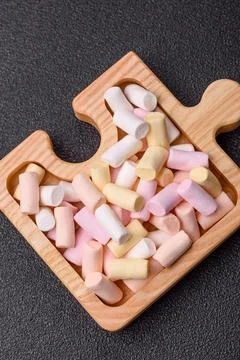 Mini marshmallows in white, pink, and pastel colors. Marshmallows as a food.. Stock Photos