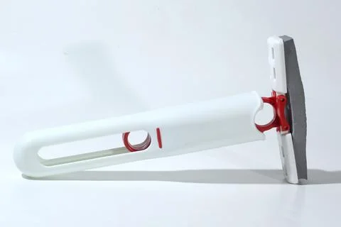 Mini Mop, small folding mop on a white background Stock Photos