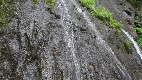 Mini mountain waterfall shot close up Stock Footage 197828237