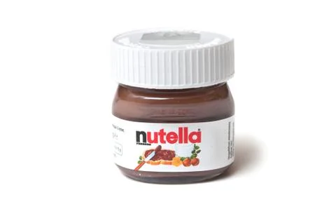 Mini Nutella container on white background Stock Photos