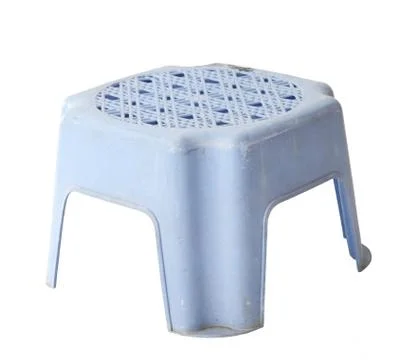 Mini old blue plastic stool isolated on white Stock Photos
