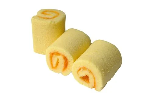 Mini orange jam rolls isolated, clipping path. Foto stock